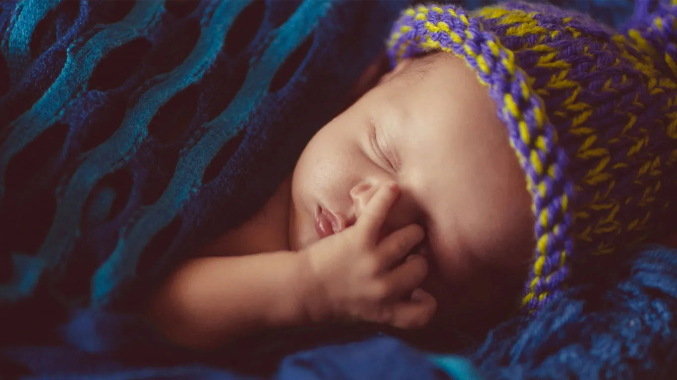 swaddle a newborn for peaceful sleep